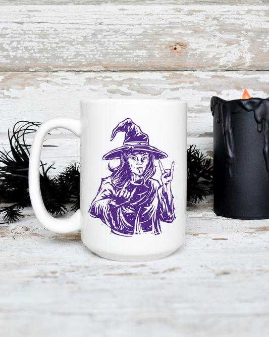 15 oz white ceramic mug featuring a purple witch making a rock hand gesture in gothic-inspired artwork.
