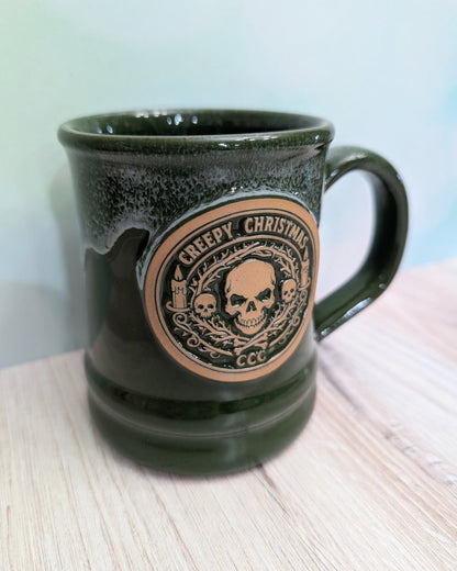 Skeleton Wreath Mug | Handmade Deneen Pottery Christmas Mug - CreepyMugs.com