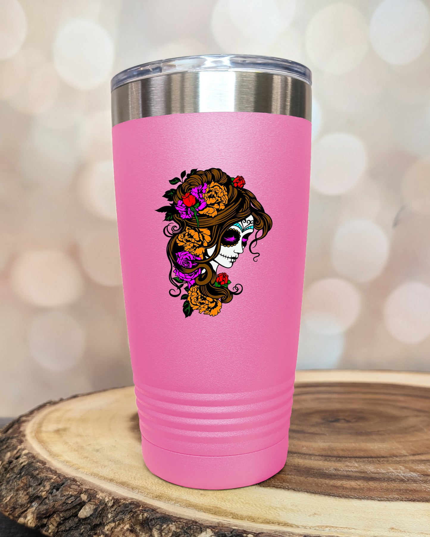 insulated tumbler featuring a colorful sugar skull woman portrait with floral accents and Day of the Dead-inspired artwork.