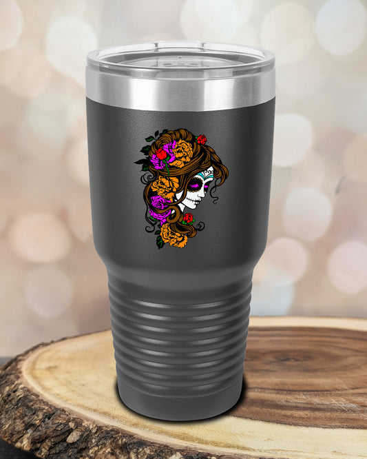 insulated tumbler featuring a colorful sugar skull woman portrait with floral accents and Day of the Dead-inspired artwork.