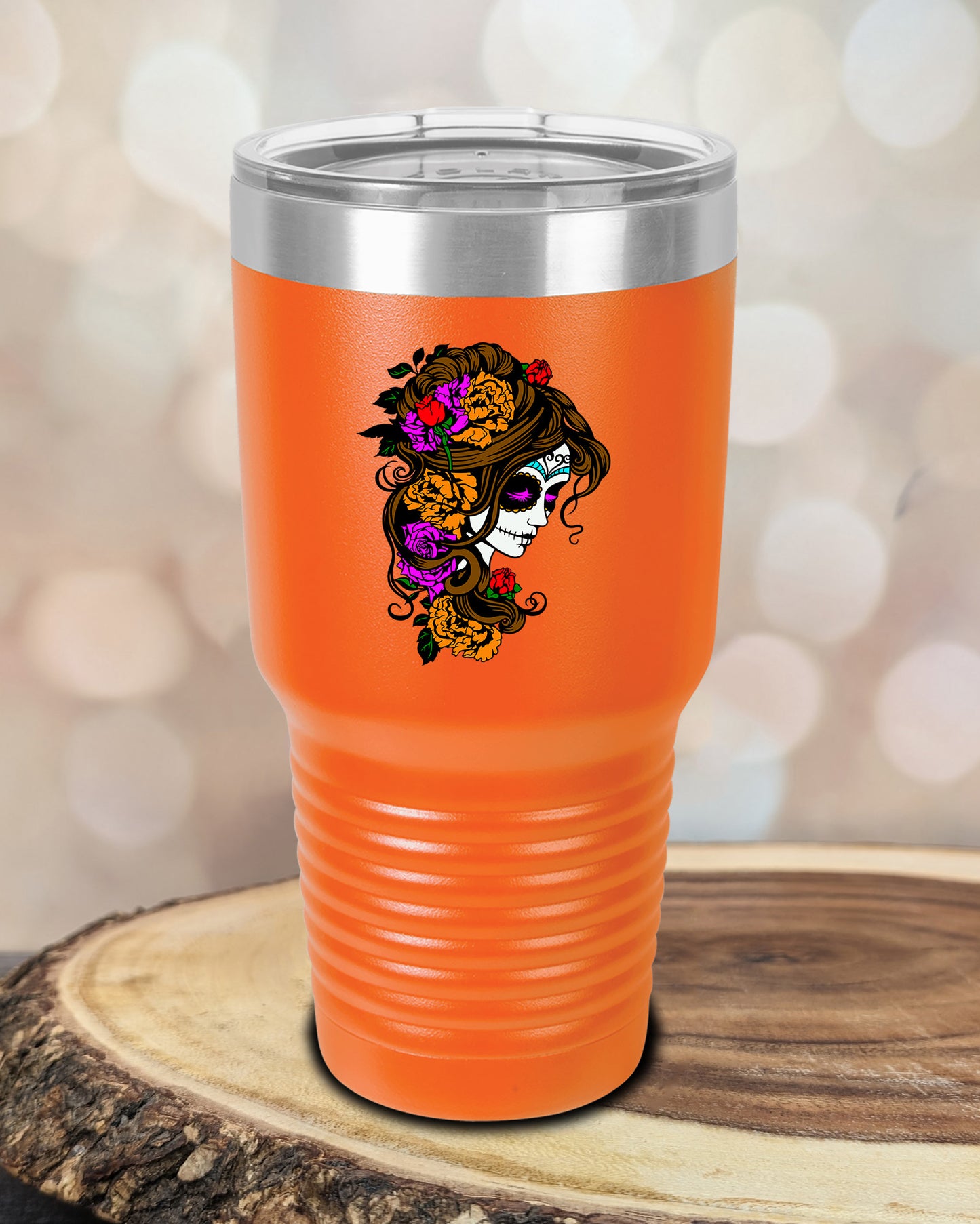 insulated tumbler featuring a colorful sugar skull woman portrait with floral accents and Day of the Dead-inspired artwork.
