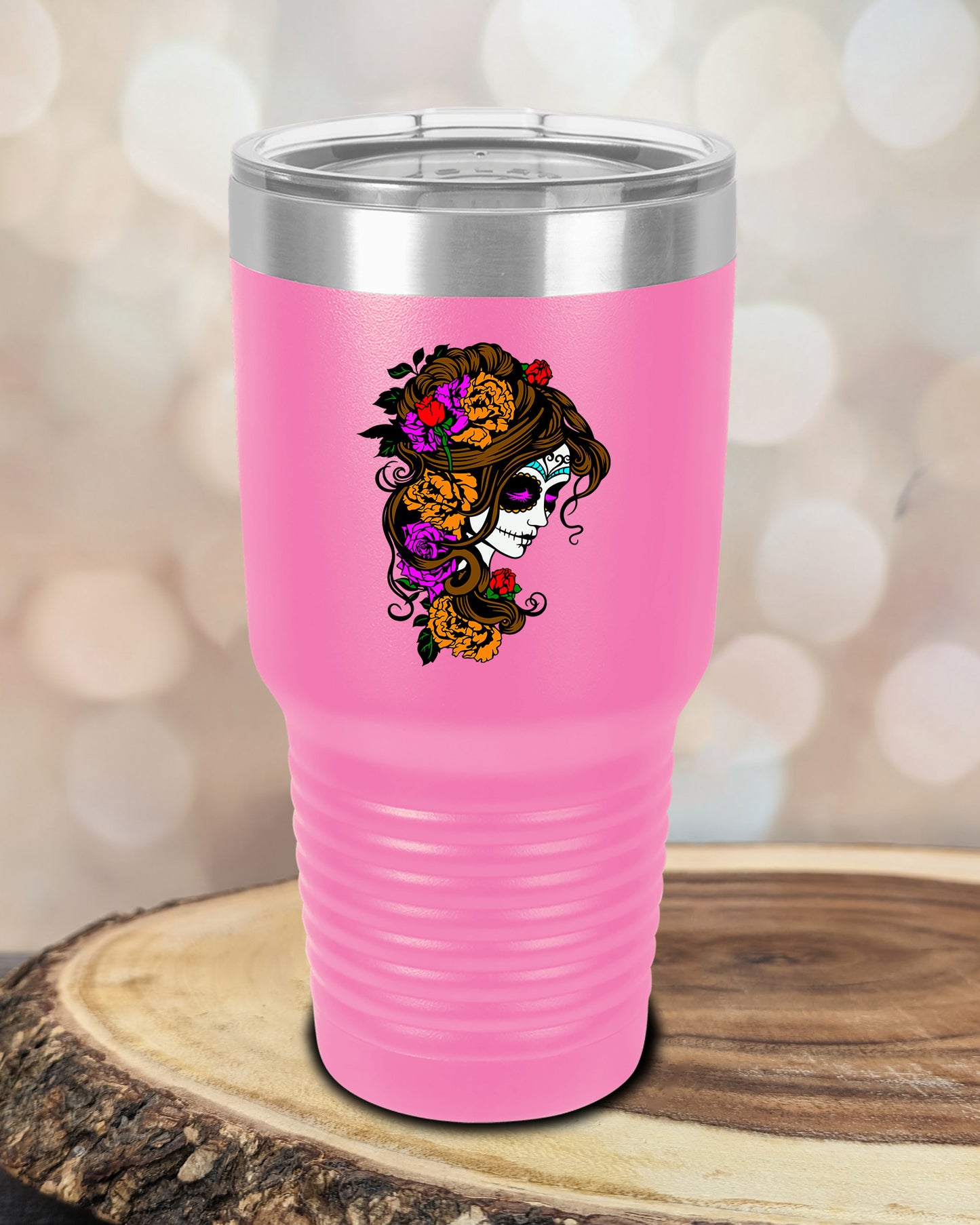 insulated tumbler featuring a colorful sugar skull woman portrait with floral accents and Day of the Dead-inspired artwork.