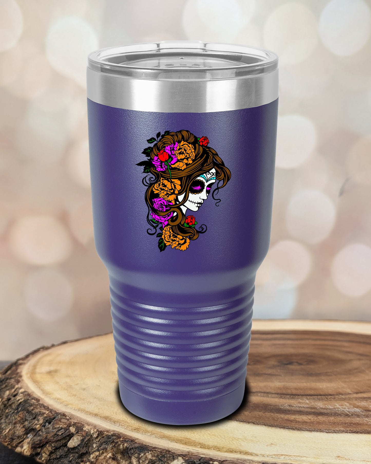 insulated tumbler featuring a colorful sugar skull woman portrait with floral accents and Day of the Dead-inspired artwork.