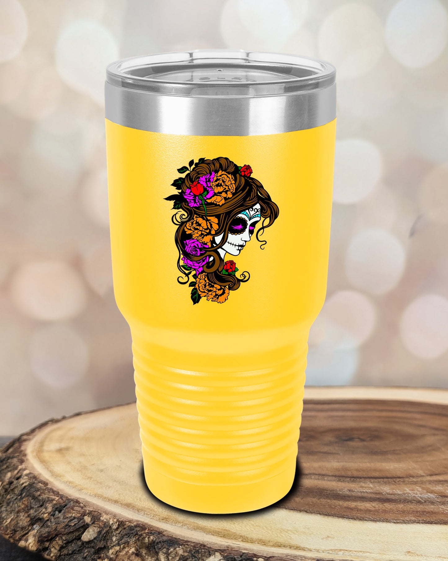 insulated tumbler featuring a colorful sugar skull woman portrait with floral accents and Day of the Dead-inspired artwork.