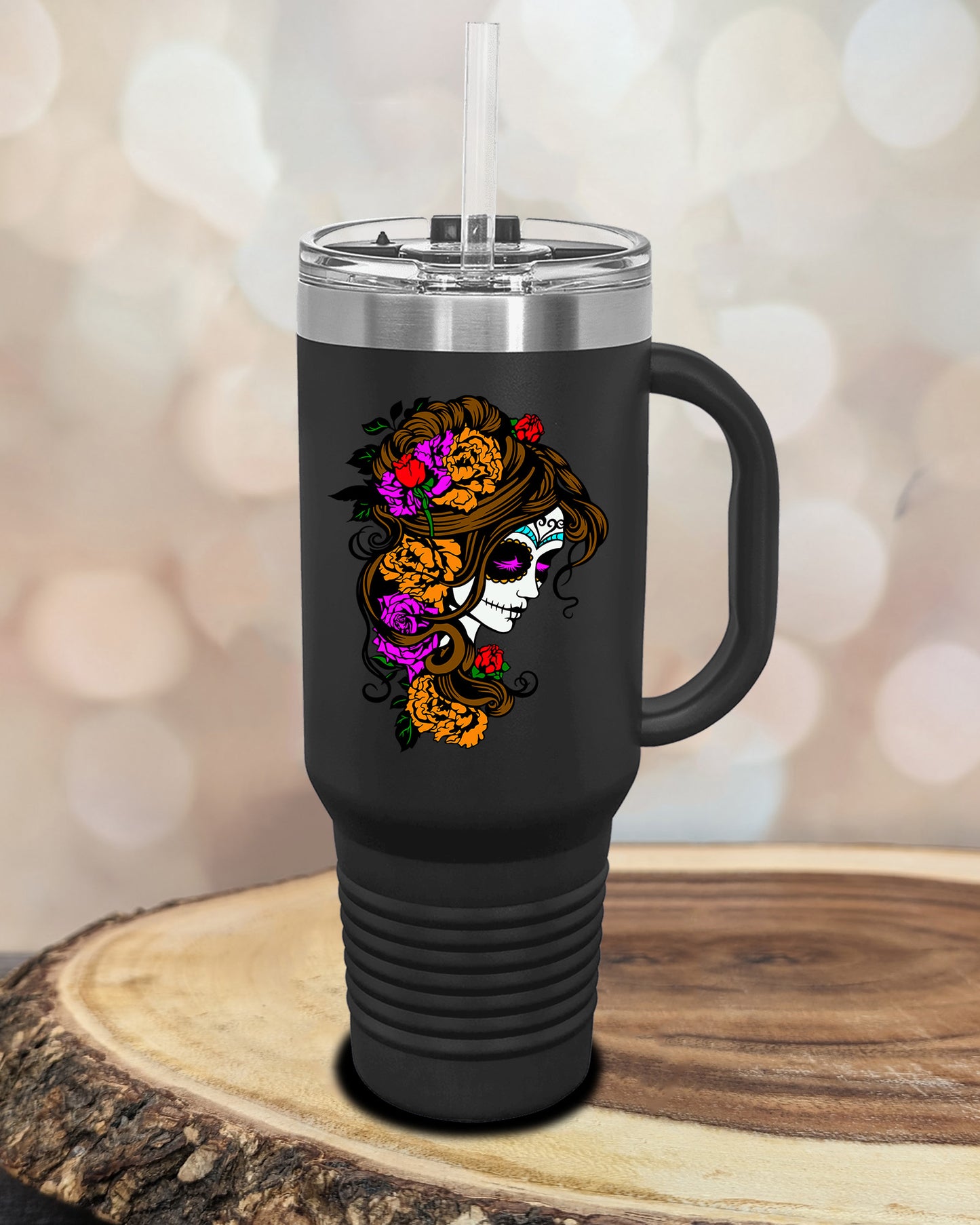 insulated tumbler featuring a colorful sugar skull woman portrait with floral accents and Day of the Dead-inspired artwork.