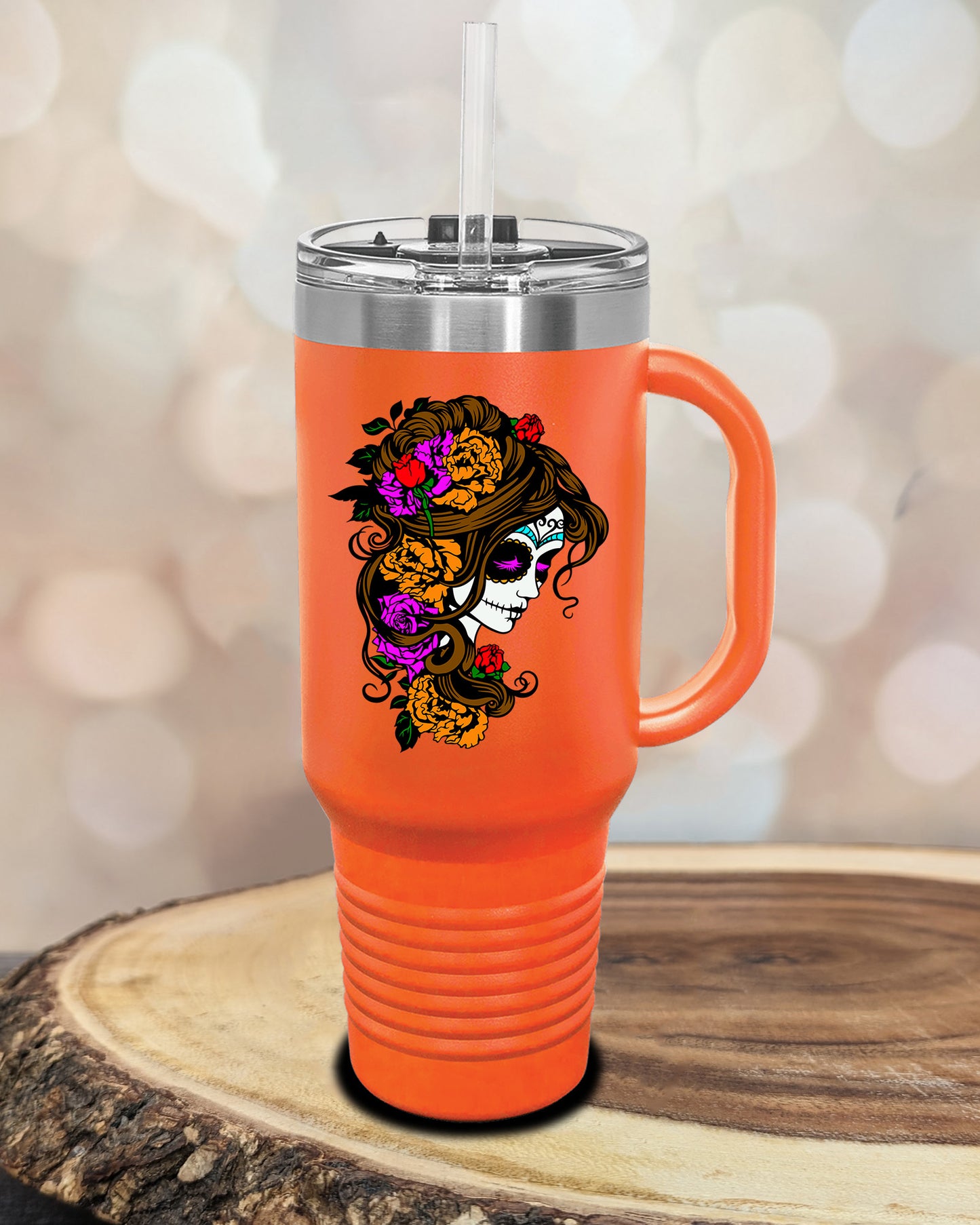 insulated tumbler featuring a colorful sugar skull woman portrait with floral accents and Day of the Dead-inspired artwork.