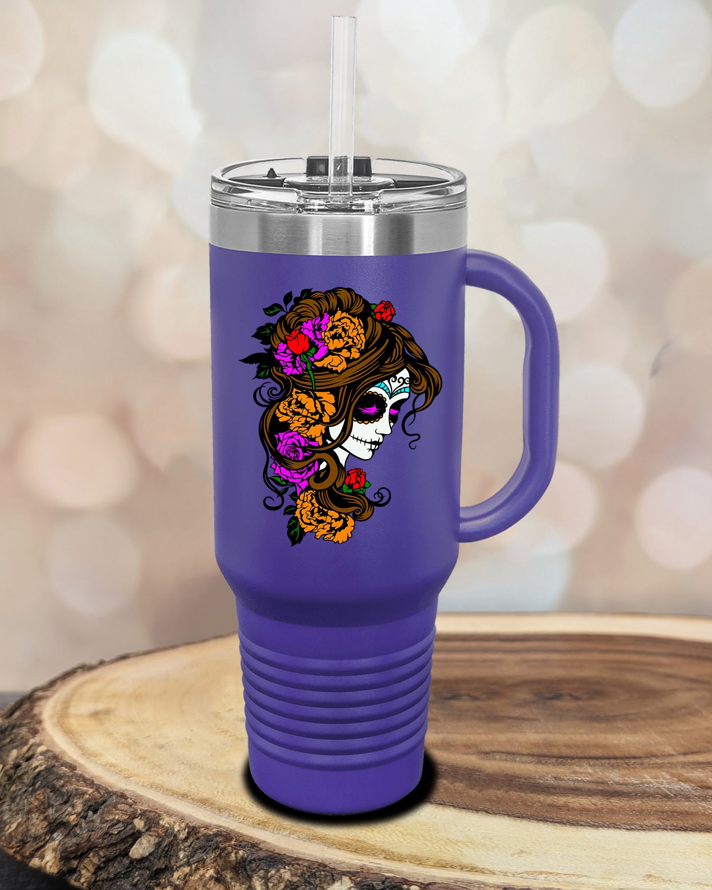 insulated tumbler featuring a colorful sugar skull woman portrait with floral accents and Day of the Dead-inspired artwork.