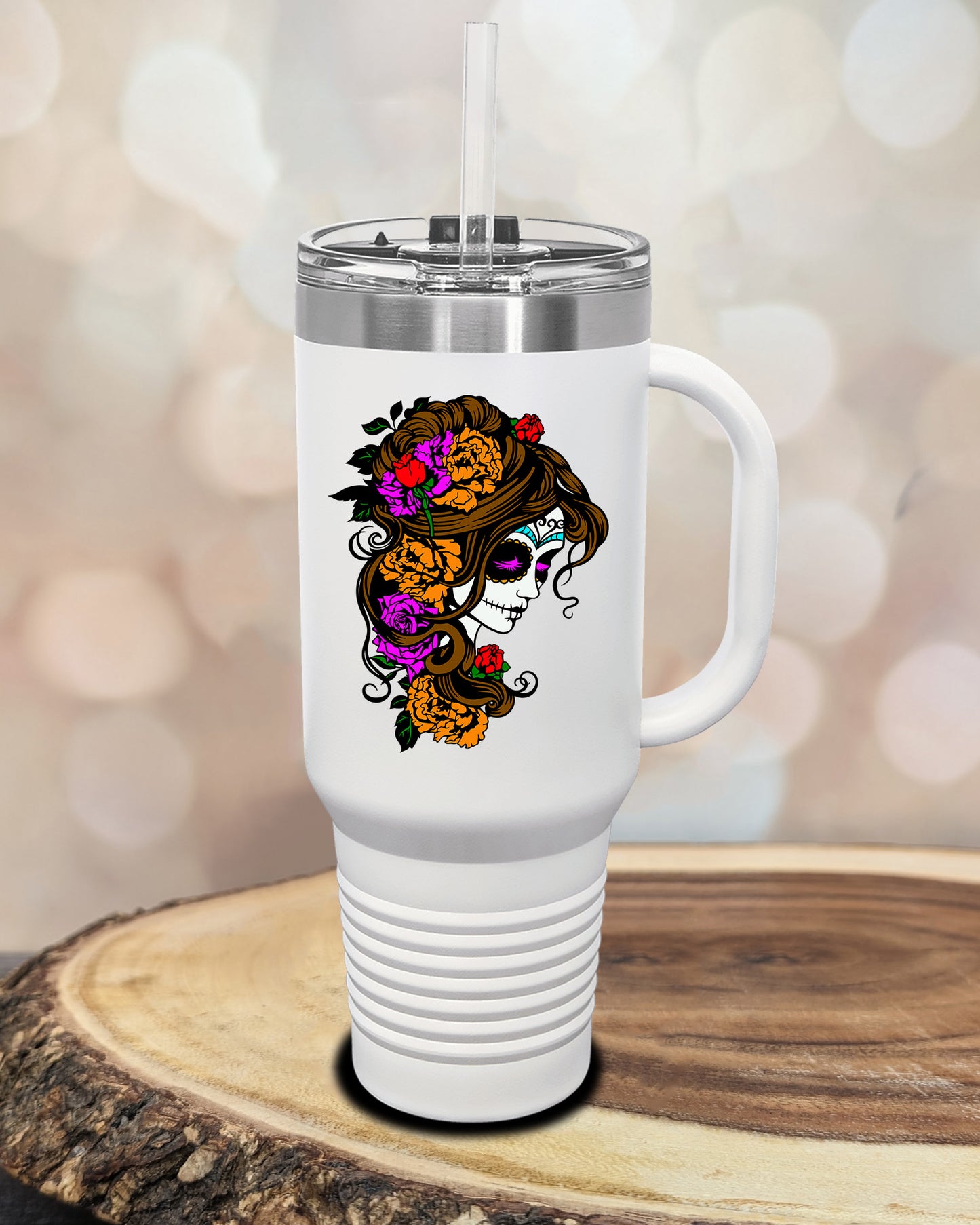 insulated tumbler featuring a colorful sugar skull woman portrait with floral accents and Day of the Dead-inspired artwork.