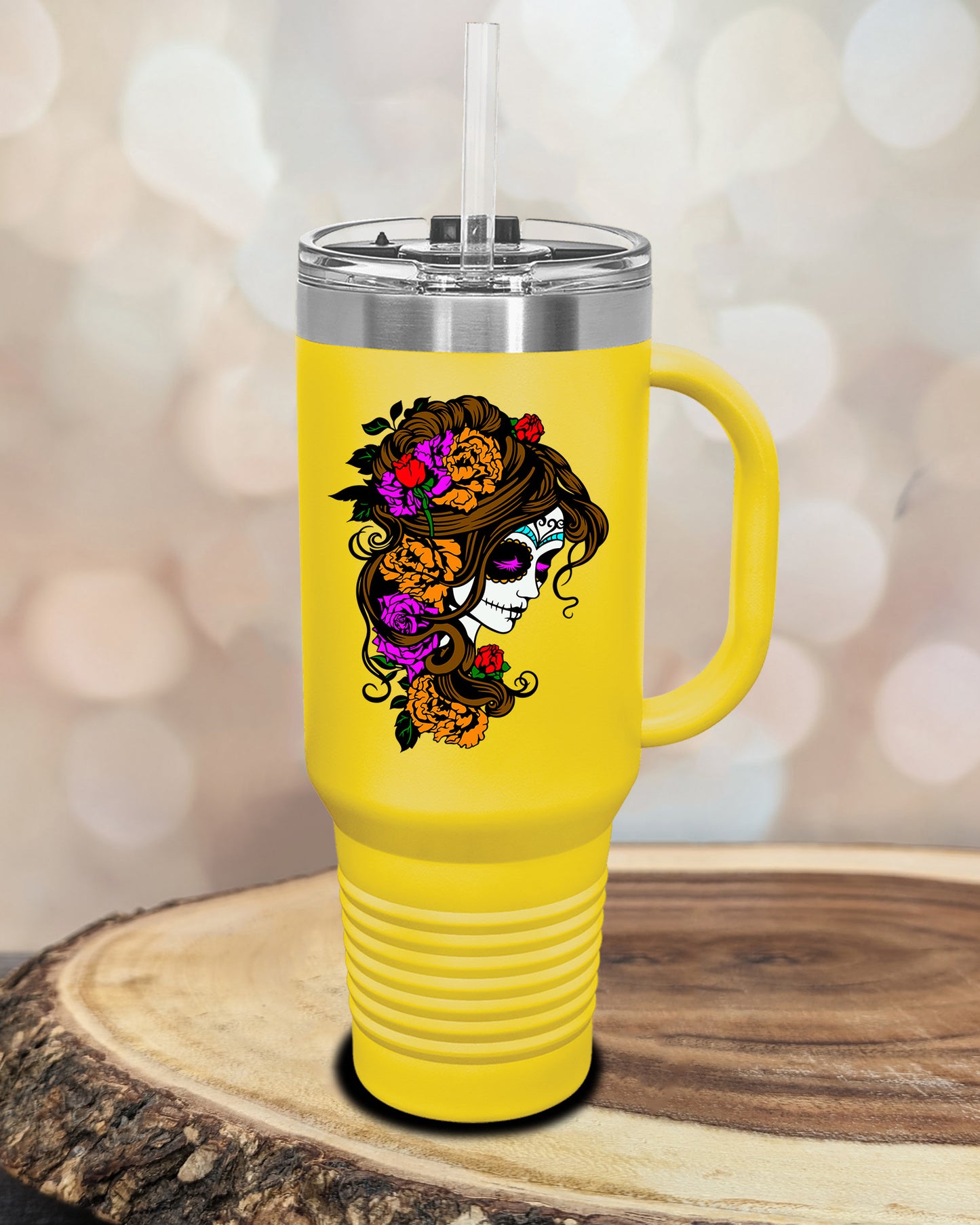 insulated tumbler featuring a colorful sugar skull woman portrait with floral accents and Day of the Dead-inspired artwork.