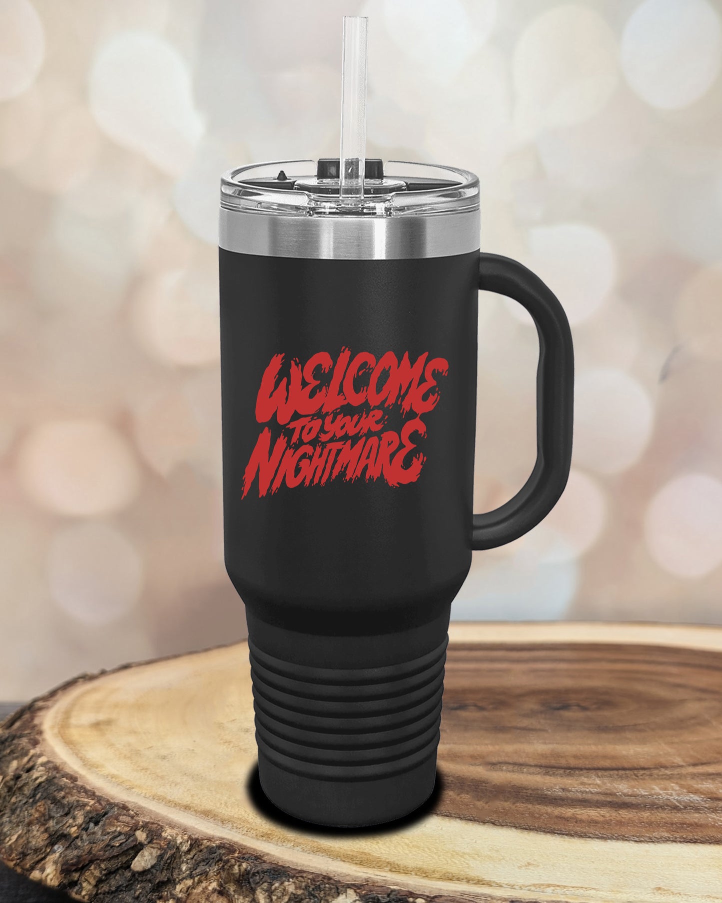 Insulated tumbler featuring Welcome to Your Nightmare horror-themed typography, available in multiple colors and sizes including 20 oz, 30 oz, and 40 oz.