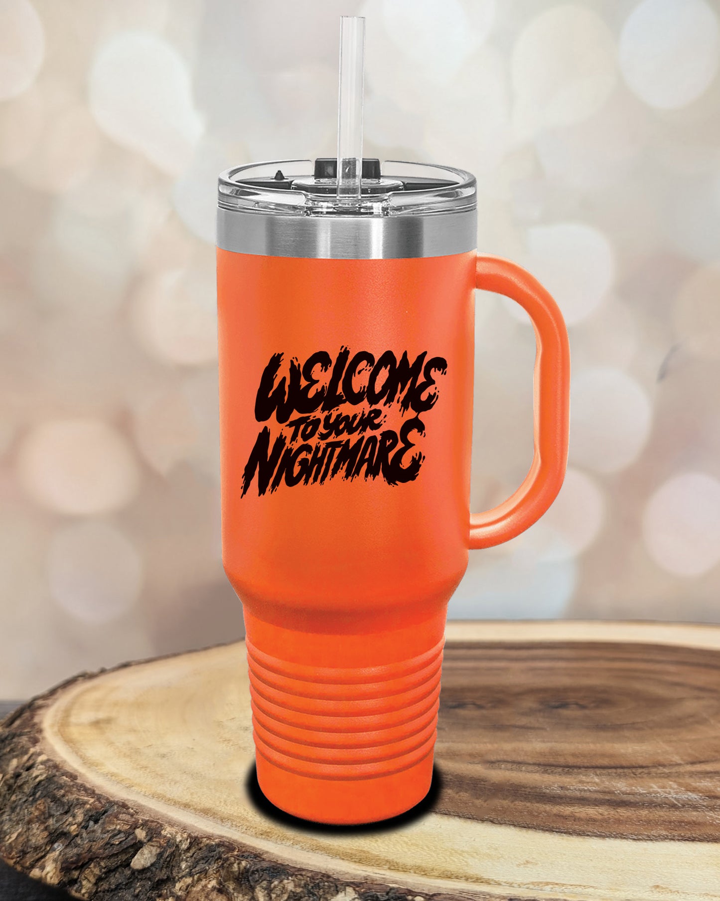 Insulated tumbler featuring Welcome to Your Nightmare horror-themed typography, available in multiple colors and sizes including 20 oz, 30 oz, and 40 oz.