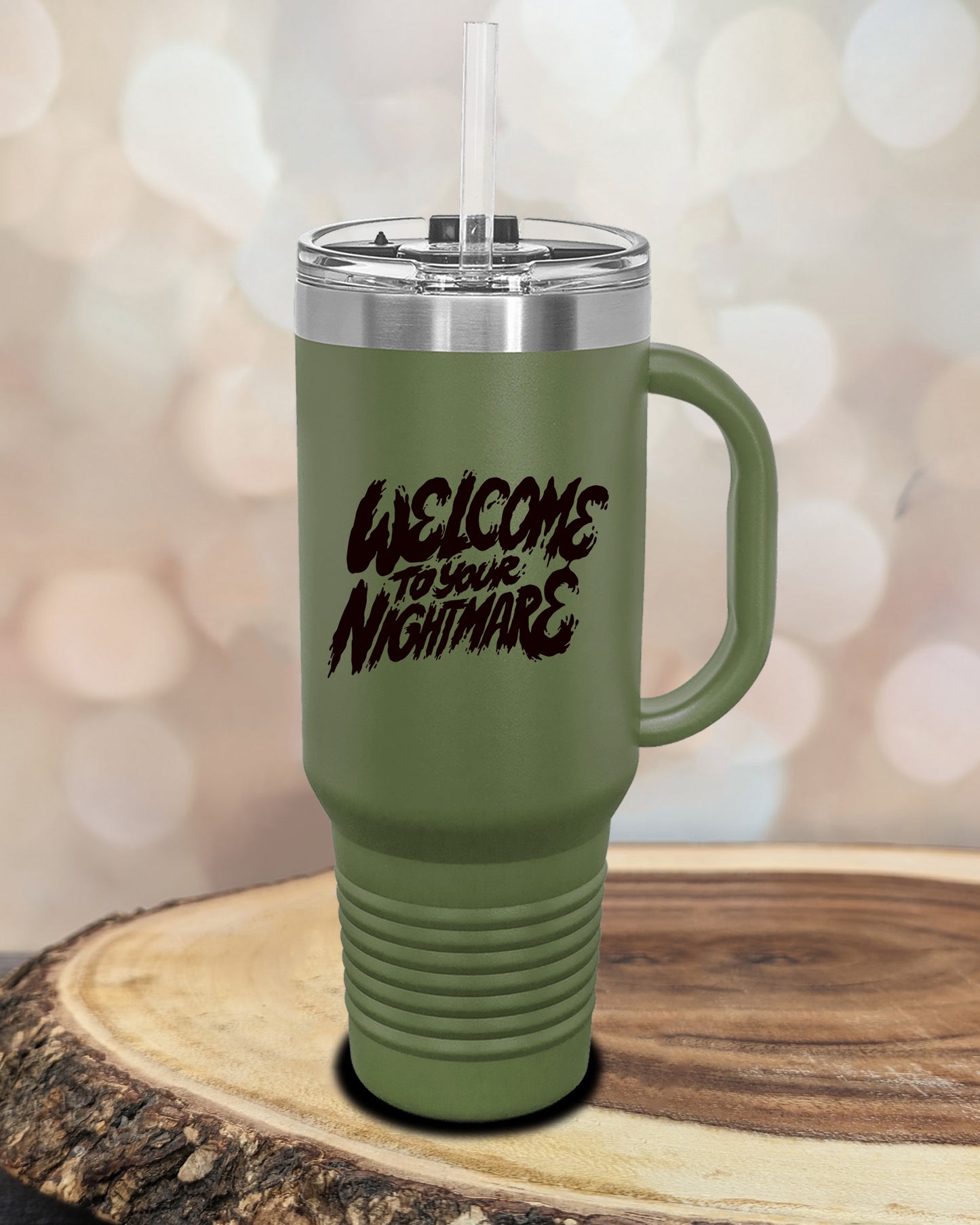 Insulated tumbler featuring Welcome to Your Nightmare horror-themed typography, available in multiple colors and sizes including 20 oz, 30 oz, and 40 oz.